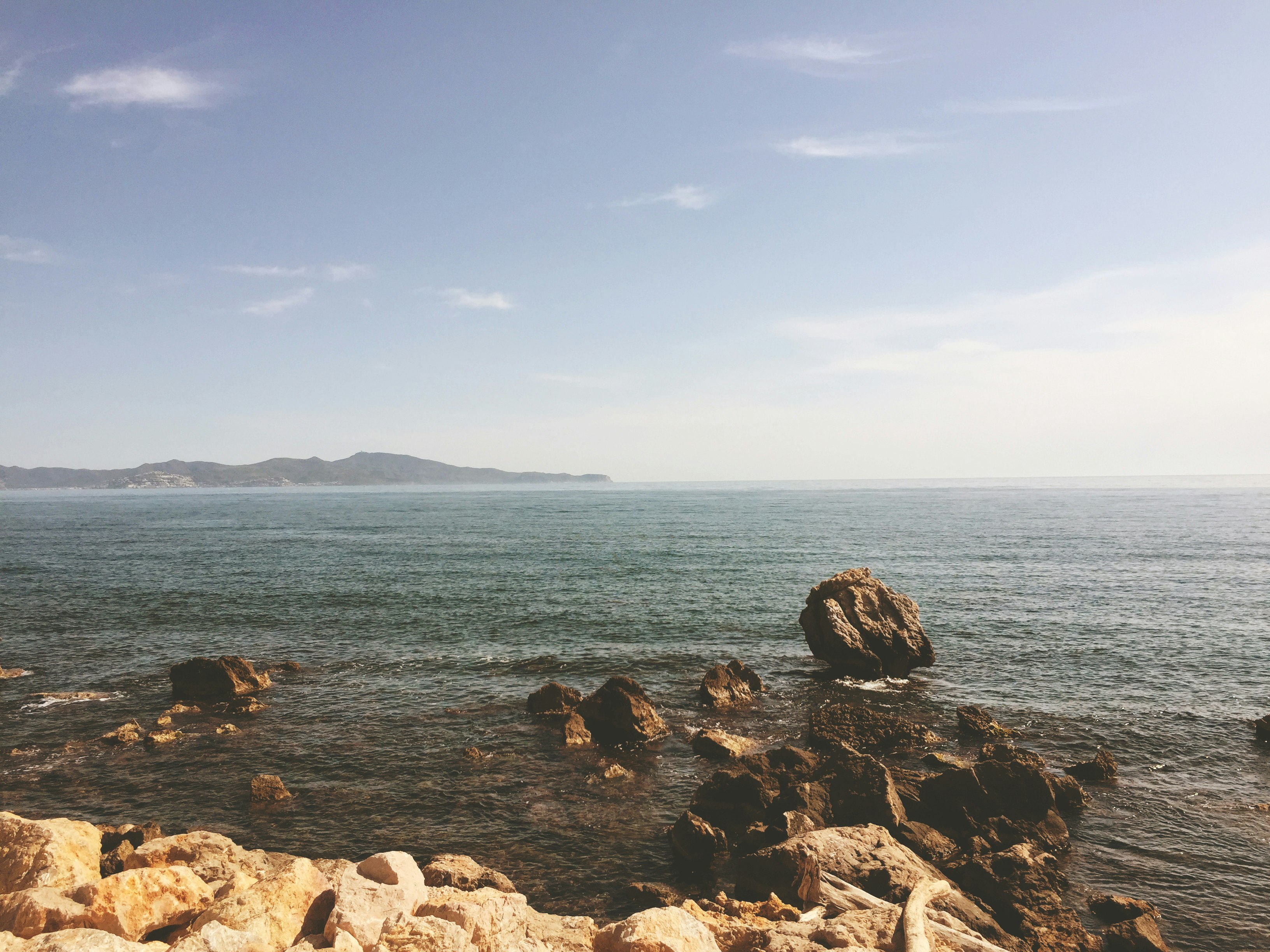 rock formations and body of water